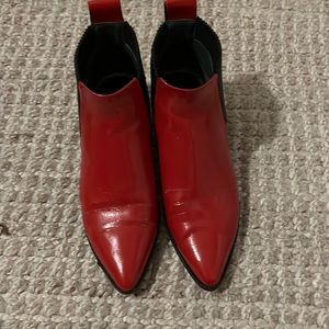 Red leather booties by Dolce vita